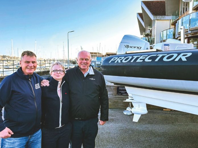 L-R Duco Snijder, Justien Hendriks, Watersportcentrum, and Andy Andrews, PB Europe. // Photo courtesy Protector Boats