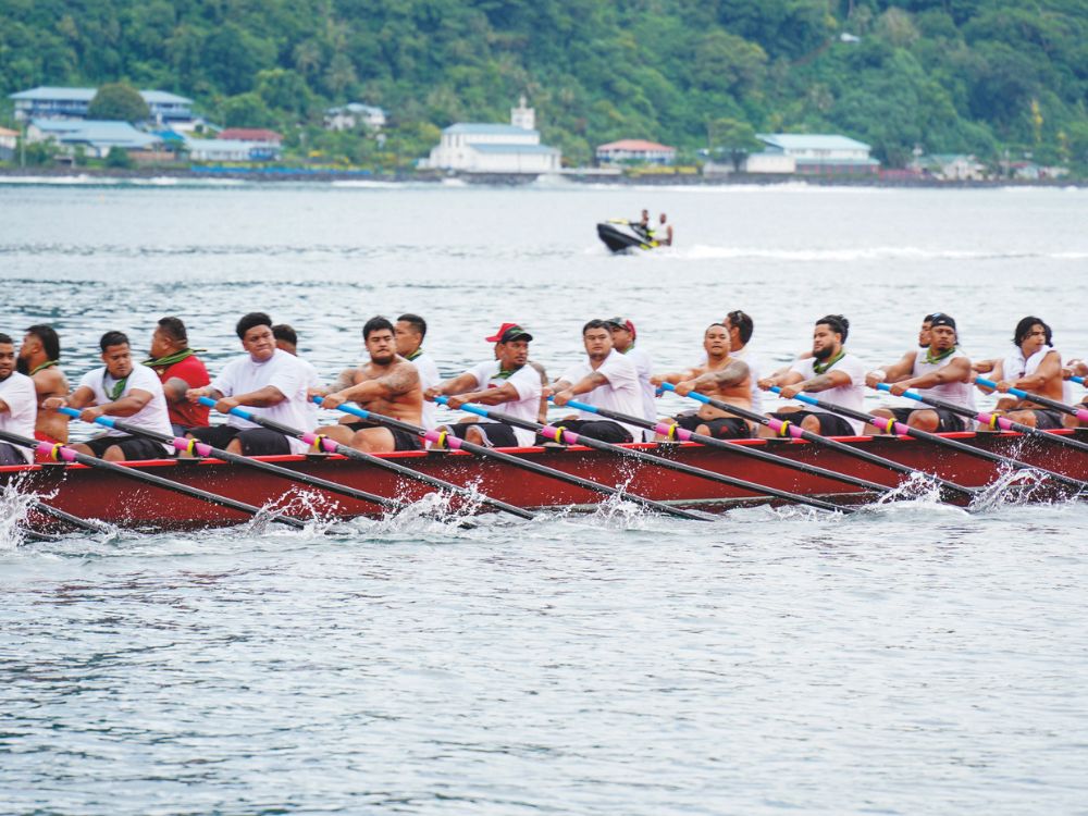 The crack rowing crew showing off their prowess on the water.