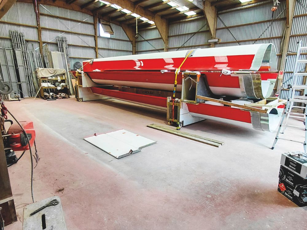The hull was built in three pieces to fit a shipping container.