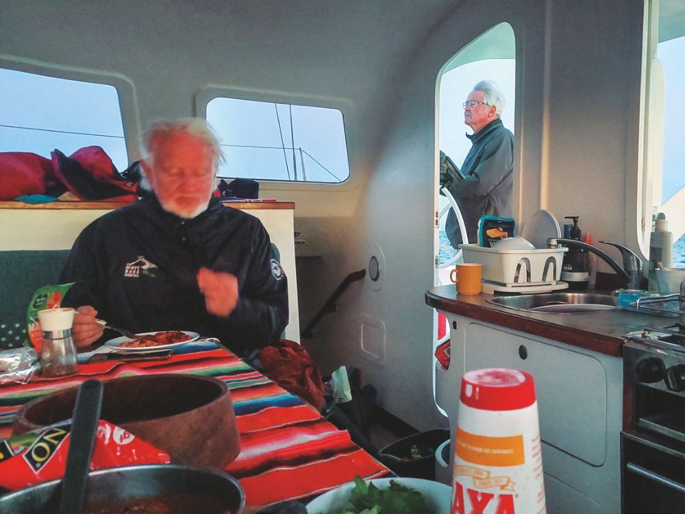 Passages can be demanding but in almost every way cruising on two hulls is better than on one. // Photo credit: Tom Linskey
