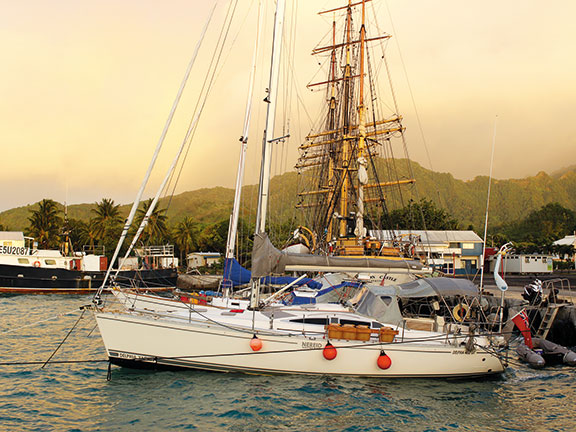 Keeping Neried off a seawall in Rarotonga as a strong swell rolls through Avatiu Harbour’s narrow entrance.