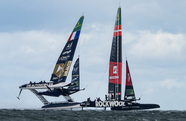 DS Automobiles SailGP Team France driven by Quentin Delapierre prevent a near capsize as the race closely behind ROCKWOOL Racing SailGP Team driven by Nicolai Sehested on Race Day 2 of the ROCKWOOL Germany Sail Grand Prix in Sassnitz, Germany. Sunday 23 August 2026. Rolex SailGP Championship Event 9 2026 Season. Photo: Jonathan Nackstrand for SailGP. 