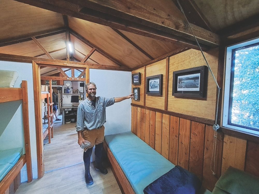Grant Allott in Walker's Hut. // Photo credit: Tom Fraser