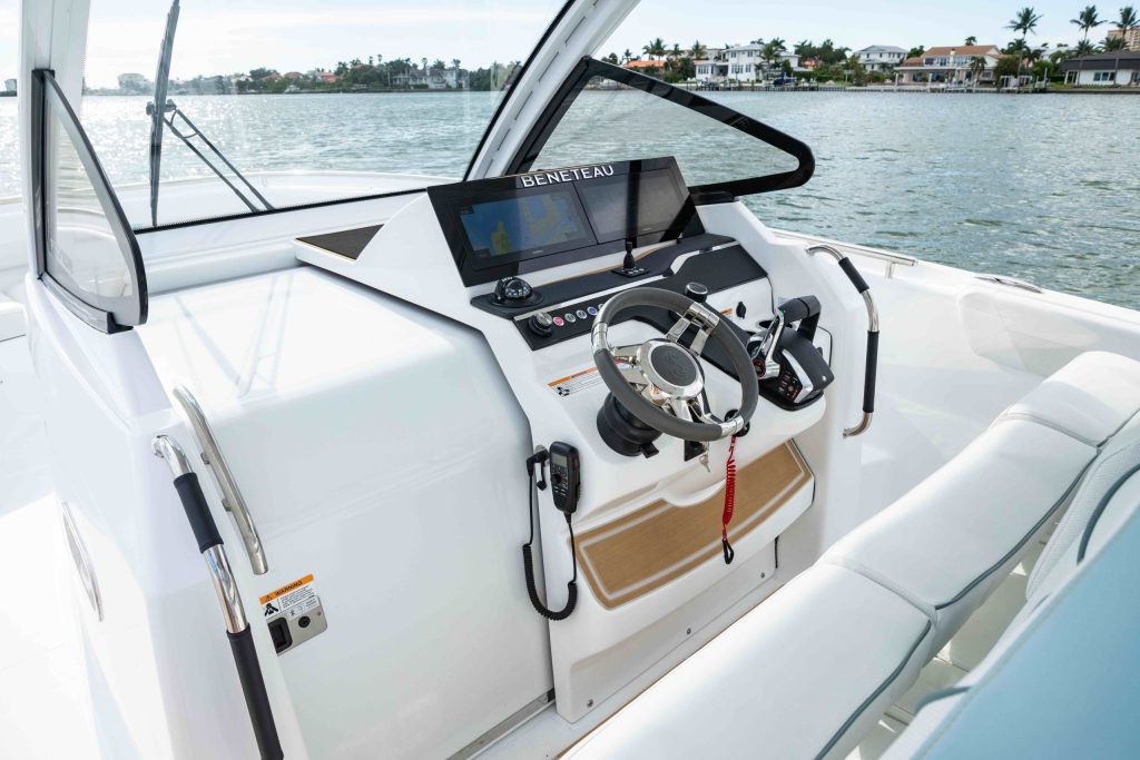 The Flyer 30’s helm brings the multifunction displays, engine controls, switches and steering together behind the windscreen. // Photo courtesy of Beneteau
