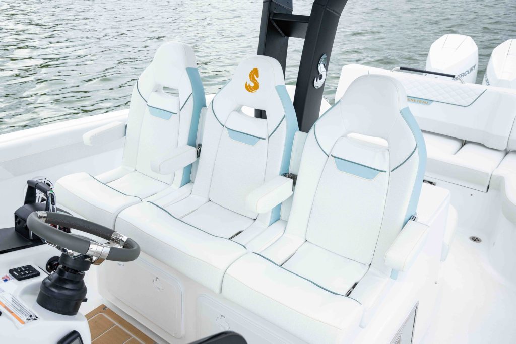 Three individual seats span the Flyer 30’s helm area, with the cockpit extending aft towards the twin outboards. // Photo courtesy Beneteau