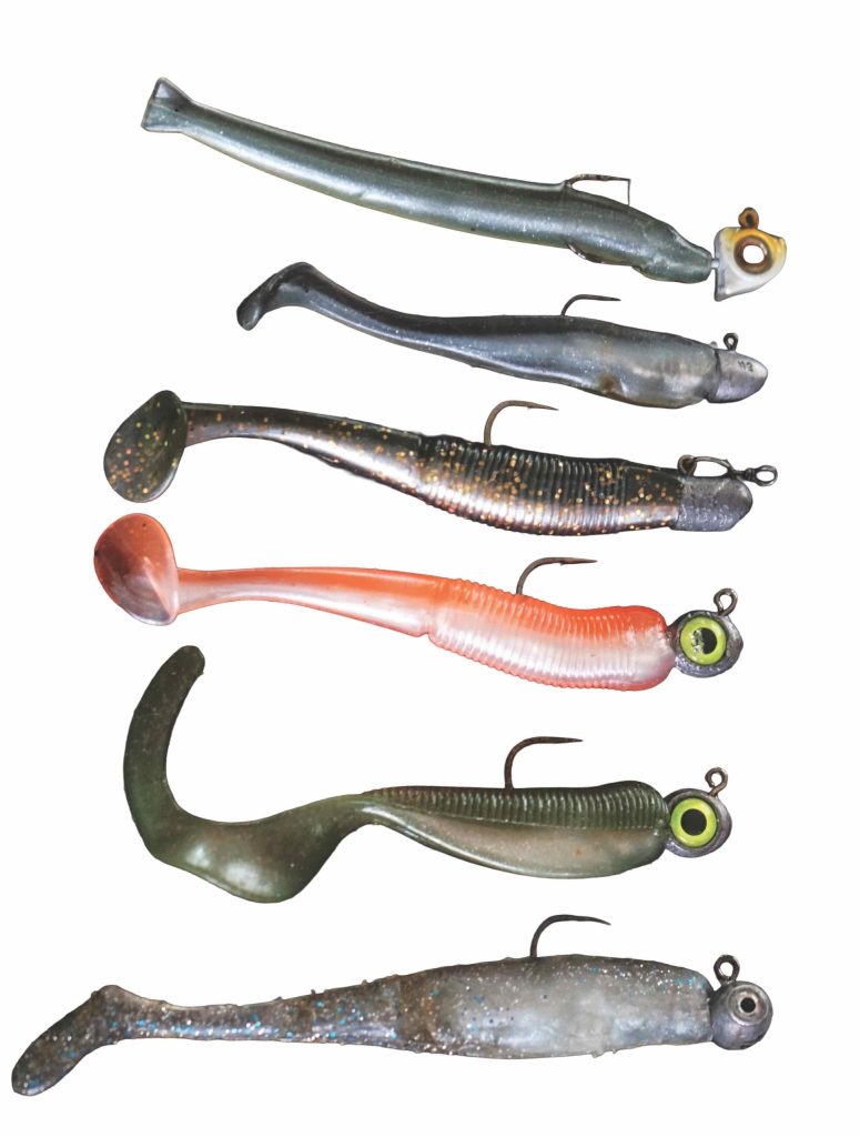 A selection of small soft-baits and light jig-heads suitable for fishing among the shallow-water anchovy action.
