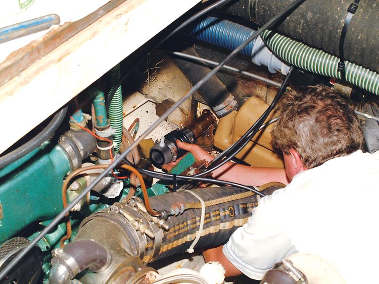 Slacken the securing hose clips on the open end of the bellows and slip the assembly over the shaft and onto the shaft tube.