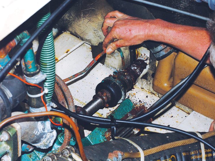 Disconnect the water feed to the prop shaft tube or old shaft seal.