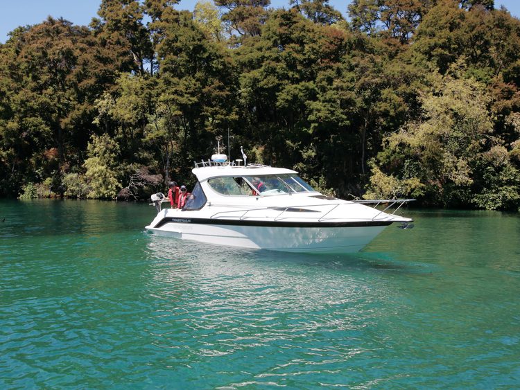 A motorboat enjoying a fishing weekend on Lake Taupo