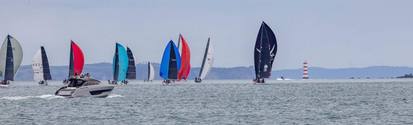 A Riva follows the fleet of the 2026 Roy McDell Memorial Cup as they head out towards the Hauraki Gulf.