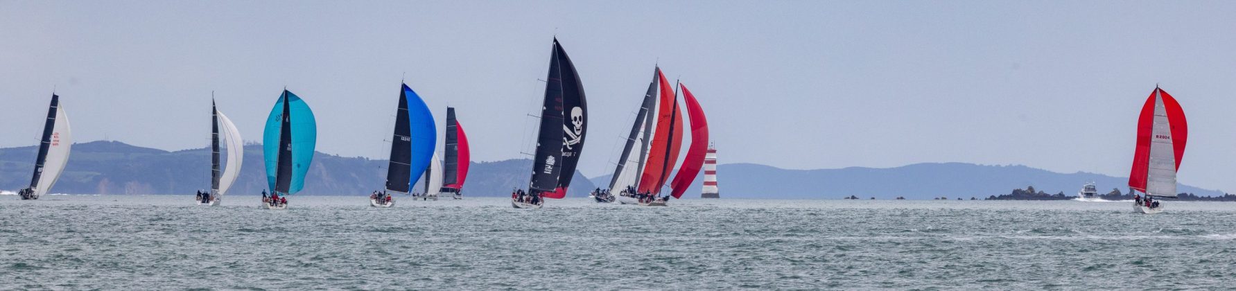 The fleet of the 2026 Roy McDell Memorial Cup as they head out towards the Hauraki Gulf.
