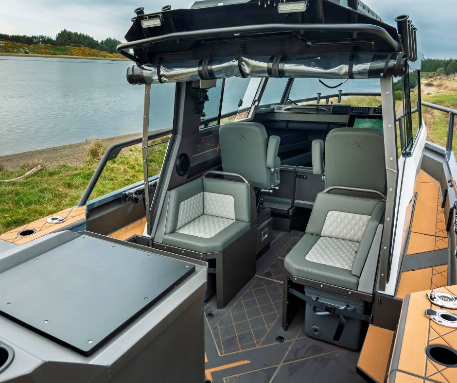 From the transom, the StabiX 250UCC’s open cockpit leads forward to the enclosed helm and cabin, with the layout designed around practical use on the water. // Photo courtesy StabiX