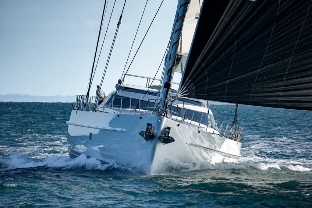 Encore powers through the chop, showing the purposeful bow and clean hull lines of her Dubois design - Encore superyacht // Photo courtesy McD Yachts