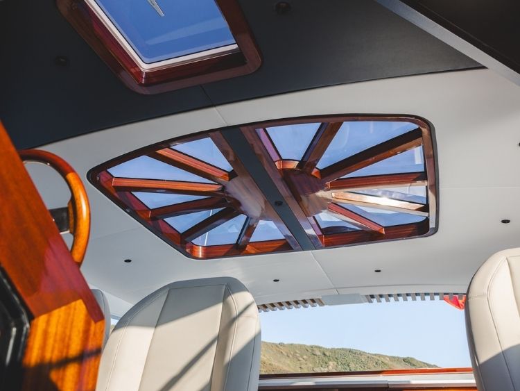 Radiating timber framing turns the hardtop glazing into a distinctive feature above the helm and cockpit. // Photo courtesy Spirit Yachts