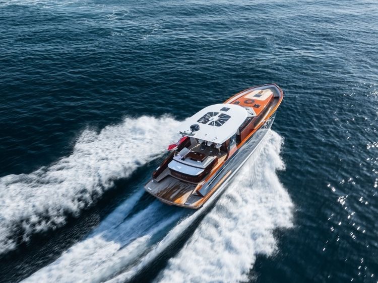Viewed from astern, the P50 reveals its broad swim platform and sheltered cockpit beneath the distinctive glazed hardtop. // Photo courtesy Spirit Yachts