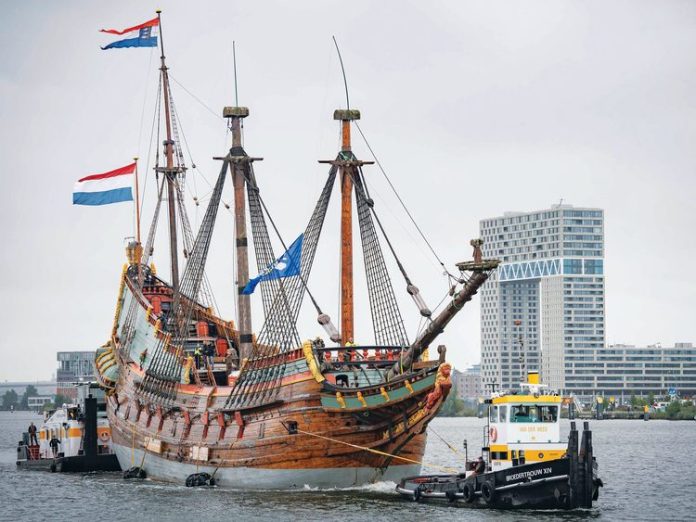 The replica Batavia is towed into central Amsterdam prior to dry-docking. Photo credit - Aalst Fotografie.